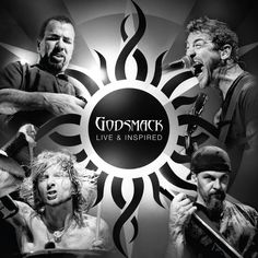 the band godsmacks performing on stage in front of a black and white background