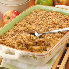 a casserole dish filled with apple crisp