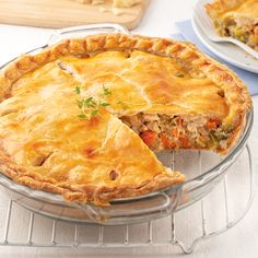 a pie sitting on top of a glass plate