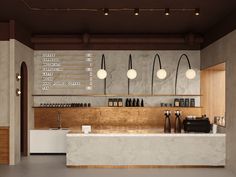 a coffee shop with marble counter tops and wooden accents, along with hanging light bulbs