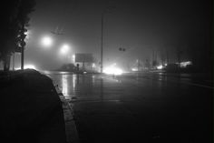 foggy night in the city with street lights