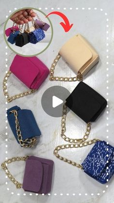 four different colored purses on a white surface with an arrow pointing to the top