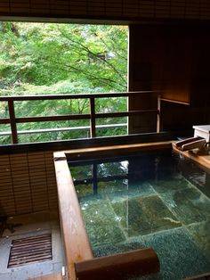 an indoor hot tub in the middle of a room