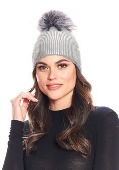 Crazy-cute and wearable, the Metallic Pom Hat is so cool, you'll wear it before the leaves fall. Why not--in Metallic Silver knit, it's stretchy and comfy. Better still, this substantial knit has recovery as well. Easy to pull on, the cap, when cuffed, measures 8" from the fur pom to the cuff fold. Ahhh, but the pièce de résistance is the oversize Grey Fox pom with Silver tipping. The magic of mixing Metallic knit with fur bestows a broad license to wear the Metallic Pom Hat with anything, every Women's Ponchos & Wraps, Kids Vest, Grey Fox, Fabulous Furs, Metallic Knit, Ladies Poncho, Leaves Fall, Kids Coats, Pom Pom Hat