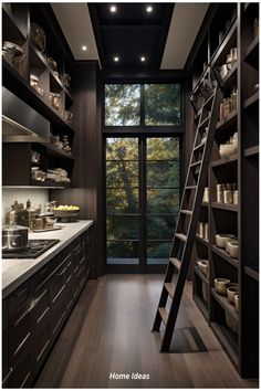 a ladder is in the middle of a kitchen with dark wood cabinets and shelving