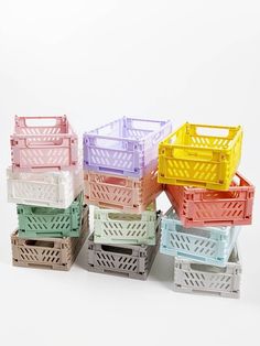 multicolored plastic crates stacked on top of each other