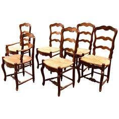 Six dining chairs from 19th century. Massive walnut hand carved frame with floral accents and rush seats. Five chairs and one armchair with lower back. All in good condition. Could be sold separately. French Provincial Dining Chairs, Carved Dining Chairs, French Country Dining Chairs, Rustic Oak Furniture, Mismatched Chairs, Provincial Style, Farmhouse Kitchens, Vintage Dining Room, Country Decorating