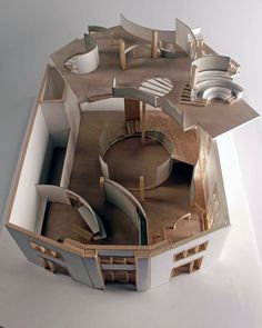 an architectural model of a building made out of cardboard