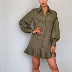 Khaki Frill Hem Shirt Dress Update Your New Season Wardrobe With This Must-Have Shirt Dress. Featuring A Khaki Material With A Button-Up Design And Cute Frill Hem, Wear This Dress With Strappy Heels And Hooped Earrings For A Look That We Are Loving. Length Approx 89cm/35" (Based On A Sample Size Uk 8) Model Wears Size Uk 8/ Eu 36/ Aus 8/ Us 4 Model Height - 5ft 6” Fabric & Care 35% Cotton 65% Polyester Please Note: Due To Fabric Used, Color May Transfer Long Sleeve Mini Dress With Button Closure For Summer, Single Breasted Long Sleeve Summer Dress, Casual Mini Dress With Buttons For Office, Long Sleeve Mini Dress With Buttons For Day Out, Casual Office Mini Dress With Buttons, Spring Khaki Shirt Dress With Buttons, Fall Mini Length Shirt Dress With Buttons, Puff Sleeve Button Shirt Dress For Summer, Long Sleeve Mini Dress With Button Closure For Spring