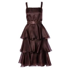 Elegant chocolate brown tiered silk party dress by Bill Blass. Simple and chic. Details: Fully Lined Matching Belt Back Zip and Hook Closure Estimated Size: Small-Medium Color: Chocolate Brown Fabric: Silk Label: Bill Blass Measurements: Bust: 38" Waist: 26" Hips: 38" Total Length: 42" Brown Vintage Dresses, Chocolate Brown Dress, Party Dress Inspiration, Dark Brown Dress, Brown Cocktail, Silk Party Dress, Dresses Brown, Red Silk Dress, Vintage Red Dress