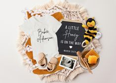 a little honey is on the way baby shower gift set with personalized onesie