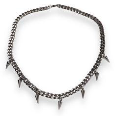 Unleash your edgy side with the Fallon Spike Necklace, a bold statement piece that fuses elegance with attitude. Featuring tiny spikes artfully arranged on a sleek, tarnish-resistant stainless steel curb chain, this necklace is perfect for adding a rebellious flair to any outfit. Designed to last, the durable construction ensures it remains a staple in your collection. Whether you're dressing up or down, the Fallon Spike Necklace delivers the perfect blend of sophistication and edge, making it an essential accessory for the modern trendsetter. Stainless steel, tarnish resistant and water proof. Wipe clean with soft cloth. Edgy Silver Jewelry With Spikes, Adjustable Punk Jewelry With Spikes, Alternative Adjustable Spiked Jewelry, Spiky Necklace, Halo Jewelry, Necklace White Gold, Spike Necklace, Necklace White, August Birthstone Jewelry