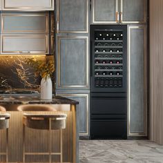 a modern kitchen with stainless steel cabinets and marble counter tops is pictured in this image