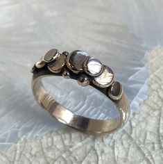 Description: A lovely unisex hammered dots sterling silver band K#673 Dimensions: Approximately width - 5mm to 3mm approx. Size: 8 *If, for any reason, you are not completely satisfied, please contact me so we can try to work out the problem. Shipping I ship twice a week. pls allow few days before shipping. Wide Silver Band, Agate Stone Necklace, Cocktail Necklace, Wide Silver Ring, Chunky Silver Rings, Sparkly Ring, Chunky Ring, Textured Ring, Chunky Rings