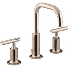 two faucets with handles on each side