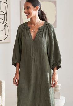 Eco friendly caftans and tunics inspired by the ocean, made on main street. Ethically sourced and locally made in Los Angeles. One of Oprah's Favorite things, in a limited edition color, this cozy, 100% cotton fabric, is a year around staple. The double gauze fabric feels like you are wearing your favorite pajamas, and bonus, it's not the least bit sheer! To make it even more irresistible, we added pockets and a flattering asymmetric hem. The raw edge details add a bit of deconstructionist chic. Long Tunics, Soft Cotton Dress, Linen Style Fashion, Business Attire Women, Hijab Style Casual, Cotton Outfit, Double Gauze Fabric, Gauze Dress, By The Ocean