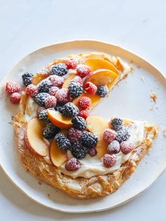 a piece of fruit pizza on a plate