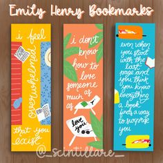 three colorful bookmarks with words on them