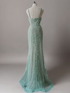 Embrace timeless elegance with our Mint Green Pretty Sequin and Beaded Spaghetti Strap Dress. This stunning evening gown showcases intricate sequin and beadwork that shimmers with every step you take. The delicate spaghetti straps and flattering sweetheart neckline add a touch of romance to this exquisite piece, making it ideal for any formal event. Intricate Sequin and Beadwork: Adorned with shimmering sequins and beads, this gown exudes sophistication and glamour. Romantic Spaghetti Straps: The dainty spaghetti straps paired with a sweetheart neckline create a graceful and feminine silhouette. Floor-Length Elegance: The floor-length design of the gown ensures a majestic and enchanting presence, perfect for evening occasions. Step into the spotlight with this beautiful mint green gown, cr Evening Gown Plus Size, Simple Satin Wedding Dress, Mermaid Board, Champagne Evening Dress, Vintage Dress Shop, Green Wedding Dresses, Fairy Wedding Dress, Sequin Evening Gowns, Gothic Wedding Dress