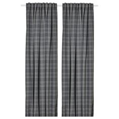 a pair of curtains with grey and white plaid pattern