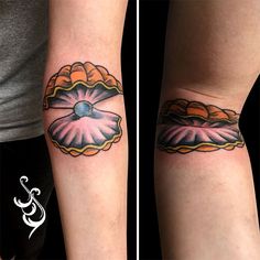 two women with matching tattoos on their arms