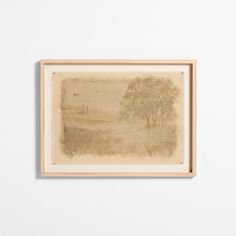 a painting hanging on the wall next to a white wall with a tree in it