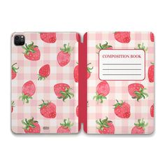 a pink and white checkered book with strawberries on it, the cover is open