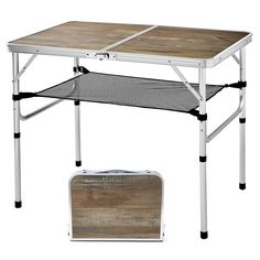 a wooden table with metal legs and an open suitcase