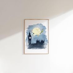 a painting hanging on the wall next to a bed in a room with white walls