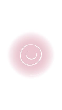 a pink circle with a smiley face drawn on it