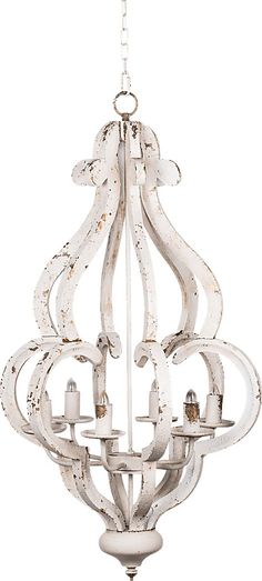 a white chandelier hanging from the ceiling