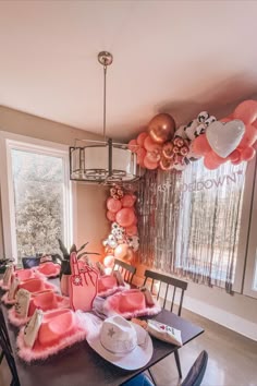 pink balloons, rose gold balloons, cowprint balloons, balloon arch over window in kitchen, kitchen table with hangover kits, feather cowgirl hats, foam finger and bride cowgirl hat, last hoedown bachelorette party, bachelorette weekend in Nashville Cowgirl Hats Bachelorette, Cowgirl Themed Bachelorette Party, Cowgirl Bachelorette Party Outfits, Bach Party Decorations, Last Hoedown, Country Bachelorette Parties, Music Line, Country Bachelorette, Bachelorette Inspo