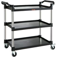 three tiered black plastic utility cart with wheels and two shelves on the bottom shelf