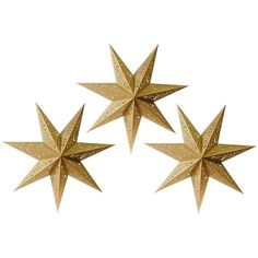 three gold star decorations on a white background