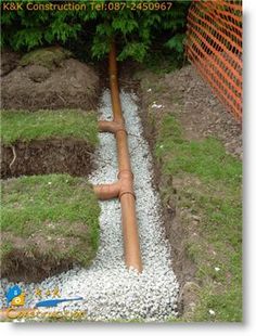 an image of a pipe going through the ground