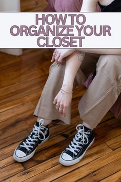 a woman sitting on the floor with her hands in her pockets and text that reads how to organize your closet