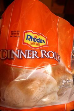 a bag of dinner rolls sitting on top of a counter