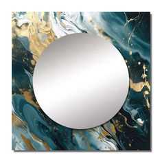 a round mirror sitting on top of a blue and gold marbled wall mounted art piece