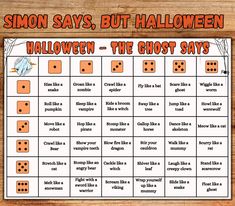 a halloween game with dices on it and the words'simon says, but halloween is