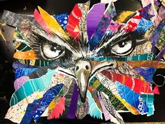 an owl made out of colorful paper and scissors