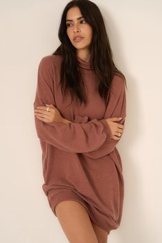 Fall in love with Kai.The Kai Funnel Neck Cozy Dress is crafted from a brushed cozy fabric, making it the perfect one-and-done piece for crisp autumn days. With banded wrists and a funnel neckline, this oversized mini dress wraps you in warmth without sacrificing style. Dress it up with tights and tall boots for an effortless seasonal look that’s as comfy as it is chic. 74% Polyester22% Rayon4% Spandex Care Instructions: Machine wash cold. Wash inside out with similar colors. Do not bleach. Lay Cozy Knit Mini Dress, Oversized Cozy Funnel Neck Top, Cozy Fitted High Neck Sweater Dress, Cozy Fitted Mini Sweater Dress, A-line Stretch Sweater Dress, Cozy Dress, Crisp Autumn, Cozy Fabric, Autumn Days