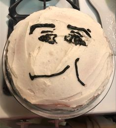 a cake that has been decorated to look like a face