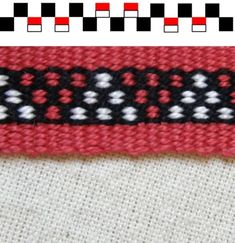 a red and black ribbon with white dots on it