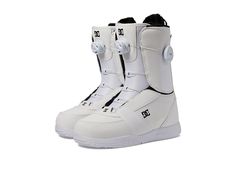 a pair of white snowboard boots on a white background