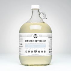 a bottle of laundry deterant on a white background