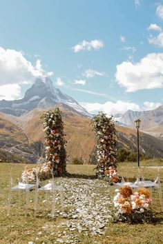 an outdoor ceremony set up in the mountains