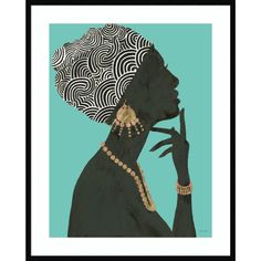 an art print with a woman's profile in black and gold on a teal background