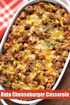 keto cheeseburger casserole in a white dish on a red and white checkered tablecloth