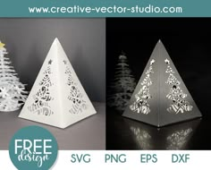 three christmas trees cut out of paper and placed on top of each other with the words free svg png eps dxf