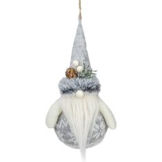 a christmas ornament hanging from a rope with a gnome's hat on it